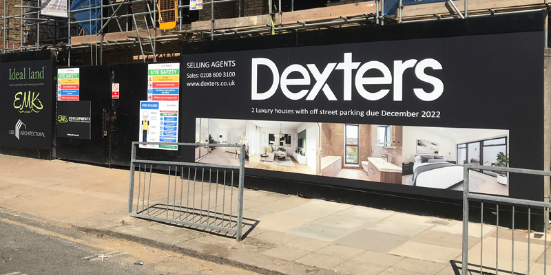 Photograph of site hoarding graphics at a site in Kensal Green